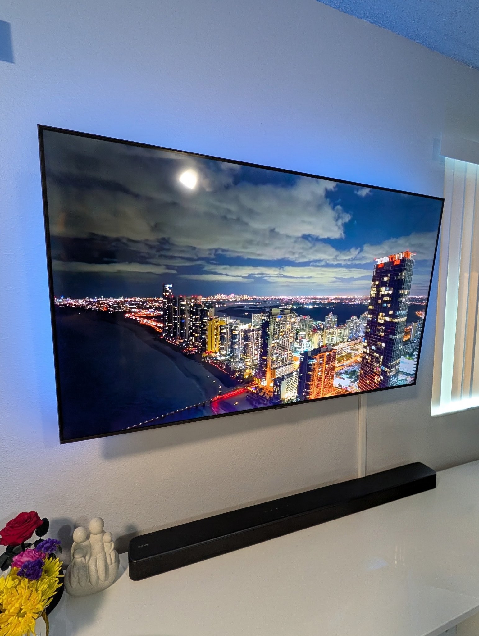 Wall-mounted TV with hidden wires installed by NowTech Pro
